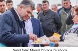 Marcel Ciolacu a degustat la Jurilovca piroșchi sărate (cu varză murată și ceapă) și piroșchi dulci (cu stafide și rahat)
